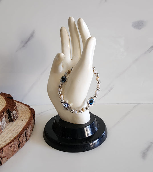 Silver and White Evil Eye Bracelet with Hamsa Hand